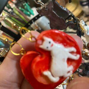 White cat on a red heart dangle earrings. Handpainted and crafted, clay jewelry